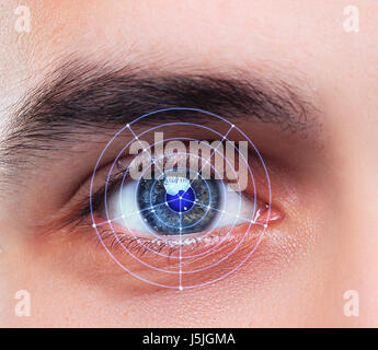 The conceptual image of digital eye of a young man Stock Photo