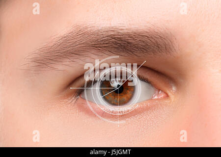 The conceptual image of digital eye of a young man Stock Photo