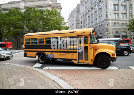 bluebird yellow united states school bus in downtown Washington DC USA Stock Photo