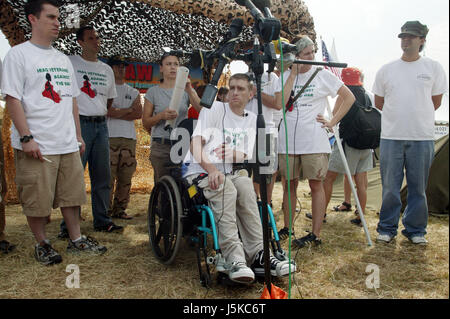 Tomas Young, who was injured on the same day as Casey Sheehan was killed, says he would like to have a meeting with George W. Bush about stem cell research. Young was paralyzed when he was shot while riding in a truck. Protests against George W Bush take place near his home in Crawford, Texas over the summer of 2005. Anti-War activist Cindy Sheehan had begun the protests after her son Casey Sheehan was killed in Iraq during the U.S. invasion. Sheehan demanded that Bush talk to her about the war, and when he didn't, she set up a protest outside his ranch. Stock Photo