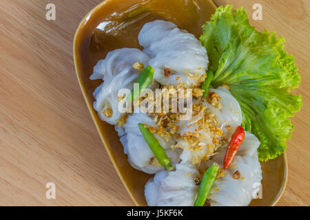 Thai dessert on wood background, Steamed rice skin dumplings Stock Photo