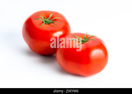 Red tomatoes isolated on white background Stock Photo