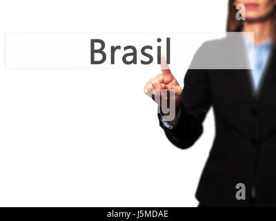 Brasil - Businesswoman pressing modern  buttons on a virtual screen. Concept of technology and  internet. Stock Photo Stock Photo