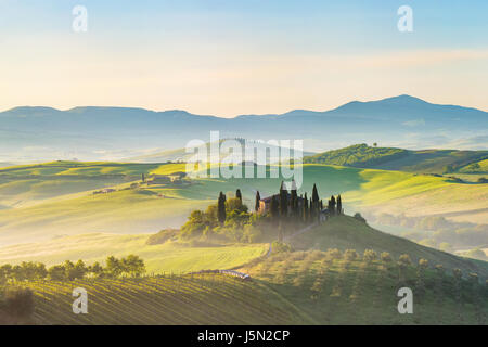 Beautiful foggy landscape in Tuscany, Italy Stock Photo