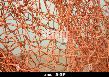 A close up shot of fish net material Stock Photo - Alamy