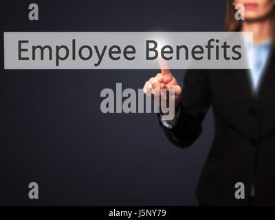 Employee Benefits - Businesswoman hand pressing button on touch screen interface. Business, technology, internet concept. Stock Photo Stock Photo