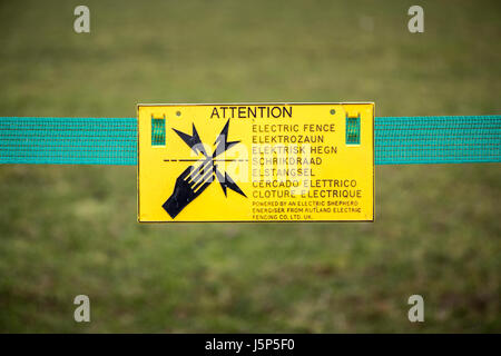 An electric fence sign. Stock Photo