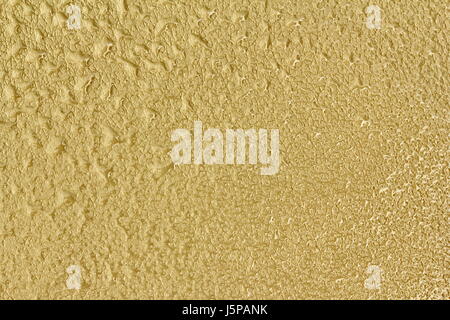Bright brown leather pad with water drops spread throughout the sheet, texture closeup and background Stock Photo