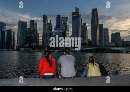 Singapore. 18th May 2017. People watch the sunset  of Singapore skyline and financial business district Credit: amer ghazzal/Alamy Live News Stock Photo