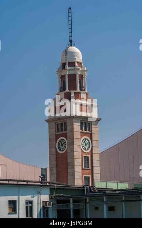 Hong Kong, China. 4th Nov, 2006. The Tsim Sha Tsui Clock Tower, a landmark in Hong Kong, is located on the southern shore of Kowloon. It is the only remnant of the original site of the former Kowloon Station on the Kowloon-Canton Railway. Hong Kong has long been a major tourist destination. Credit: Arnold Drapkin/ZUMA Wire/Alamy Live News Stock Photo