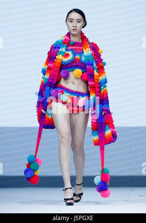 Beijing, China. 18th May, 2017. A model presents a creation designed by graduates of Sino-French IFA Institute of Fashion Designer of Shanghai University of Engineering Science at the China Graduate Fashion Show in Beijing, capital of China, May 18, 2017. Credit: Chen Jianli/Xinhua/Alamy Live News Stock Photo