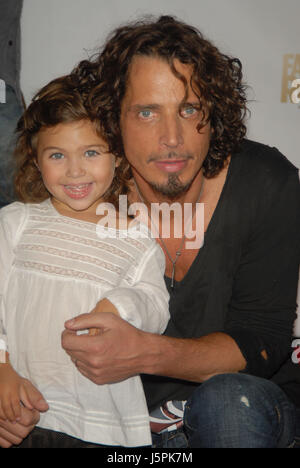 May 18, 2017 - File Photo - CHRIS CORNELL, has died unexpectedly at the age of 52. The rocker owned arguably the best pipes in the business and shone as frontman for grunge legends Soundgarden, which ruled the Billboard 200 with their 1994 classic Superunknown, and later with Audioslave, whose 2005 album Out of Exile scaled the main charts. Cornell also collaborated with members of what would become Pearl Jam to form Temple of the Dog. Pictured: Sep 05, 2008 - New York, New York, USA - Singer CHRIS CORNELL and daughter at the red carpet arrivals for Conde Naste Media Group's 5th Anniversary of Stock Photo