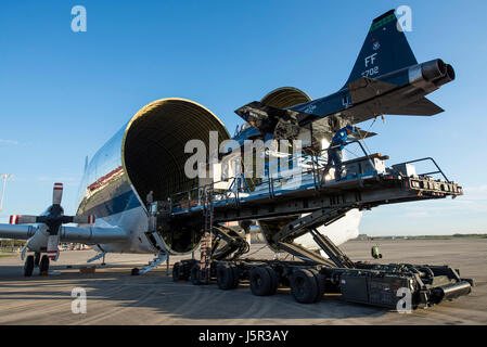A USAF T-38 Talon supersonic jet trainer is unloaded from a NASA B-377 Super Guppy cargo aircraft at Joint Base San Antonio-Randolph March 3, 2017 near Universal City, Texas.    (photo by Stormy Archer /US Air Force  via Planetpix) Stock Photo