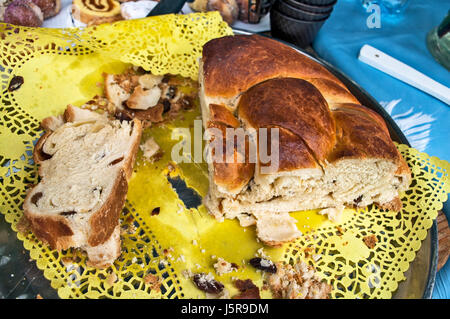Small cakes  exposed on the table for tasting and sale. Stock Photo