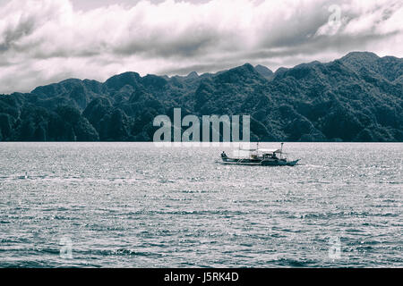 from a boat  in  philippines  snake island near el nido palawan beautiful panorama coastline sea and rock Stock Photo