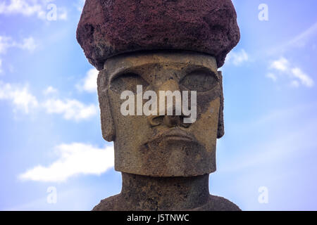 Close view of  Moai Statue Face of Ahu Nau Nau wearing topknot near Anakena Beach - Easter Island, Chile Stock Photo