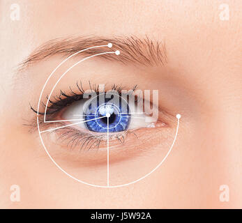 The conceptual image of digital eye of a young woman Stock Photo