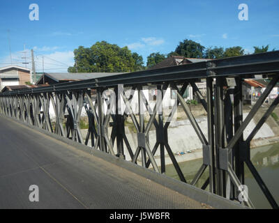 This image highlights the Vicente Bridge, crossing over the Sapo River ...