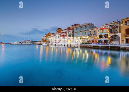 Evening view of Agios Nikolaos and its harbor, Crete, Greece. Stock Photo