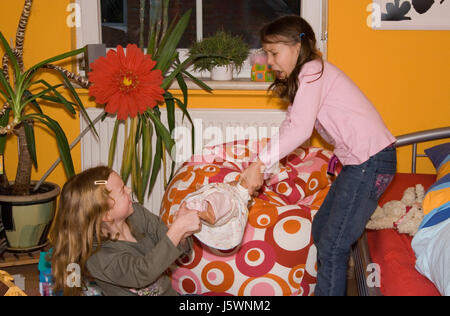 argue raving furious angry irately nurseries child quarreling arguing girl Stock Photo