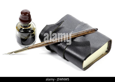 old fashioned diary with dib pen and inkwell isolated on white background Stock Photo