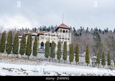 The Cantacuzino Palace (Palatul Cantacuzino) from Busteni, Romania, winter time with snow and ice. Stock Photo