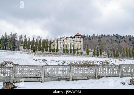 The Cantacuzino Palace (Palatul Cantacuzino) from Busteni, Romania, winter time with snow and ice. Stock Photo