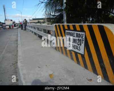 The Rodriguez Street Bridge spans across Estero de Vitas, connecting ...