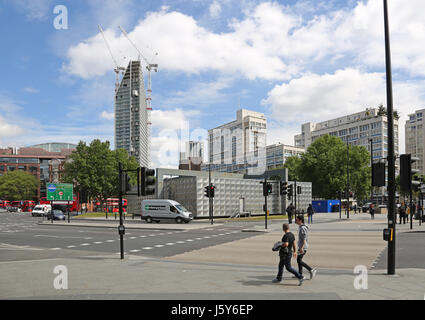 The newly redeveloped road layout at London's Elephant and Castle junction. Show the silver Michael Faraday memorial and new pedestrian crossings Stock Photo