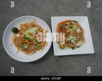 0395 Cuisine of Bulacan Fried itik pugo pancit  13 Stock Photo