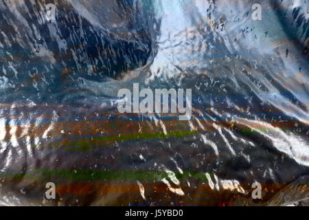 A texture made from a photo of the Solent and a barbie cover Stock Photo