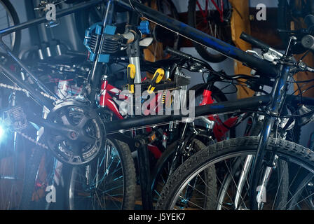 Master bike repairs workshop in their own hands Stock Photo
