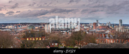 Elevated view of skyscrapers, hotels and ware houses in the North of Leeds under blue skies Stock Photo