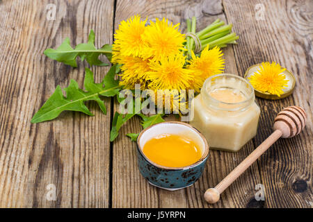 Herbal tea and honey from dandelions on wooden background. Studio Photo Stock Photo