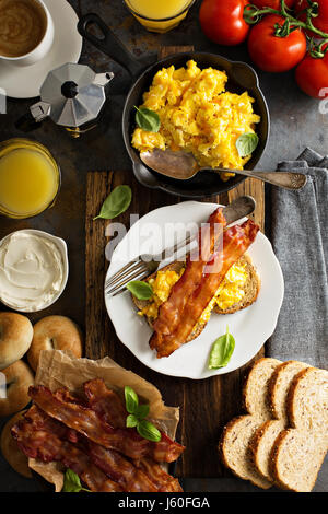 Big breakfast with bacon and scrambled eggs