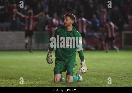 Carlisle United goalkeeper Mark Gillespie is dejected after Exeter City's Jack Stacey scored his side's third goal of the game during the Sky Bet League Two play-off second leg at St James Park, Exeter. Stock Photo