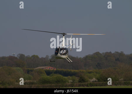 Helicopter over Wolverhampton Halfpenny Green Airport. UK Stock Photo