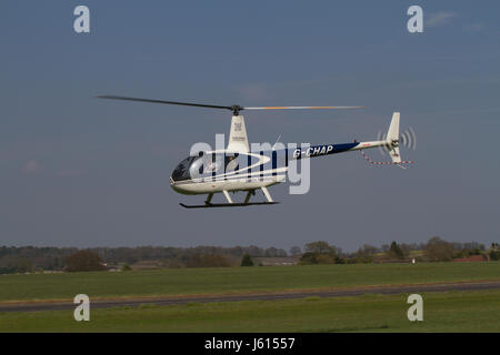 Helicopter over Wolverhampton Halfpenny Green Airport. UK Stock Photo