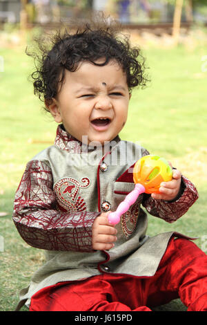 Cute little child with Khulkhula, also known as Maracas or Rumba shakers Stock Photo