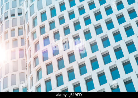 skyscraper facade with sunlight lens flare - building exterior Stock Photo