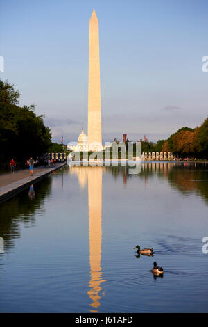 the washington monument and reflection in the reflecting pool national mall Washington DC USA Stock Photo