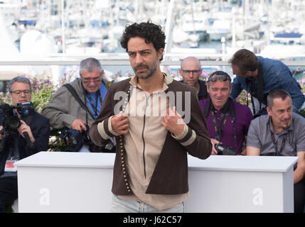 Cannes, France. 19th May, 2017. Actor Ghanem Zrelli poses for a photocall of the film 'Alaka Kaf Ifrit' during the 70th Cannes Film Festival at Palais des Festivals in Cannes, France, on May 19, 2017. Credit: Xu Jinquan/Xinhua/Alamy Live News Stock Photo