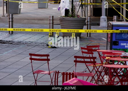 New York, New York, USA. 18th May, 2017. Crime scene markers near the damaged vehicle as emergency workers investigate the scene of a car crash in Times Square that took the life of an 18 year-old Michigan girl and injured 22 others Credit: Kevin C. Downs/ZUMA Wire/ZUMAPRESS.com/Alamy Live News