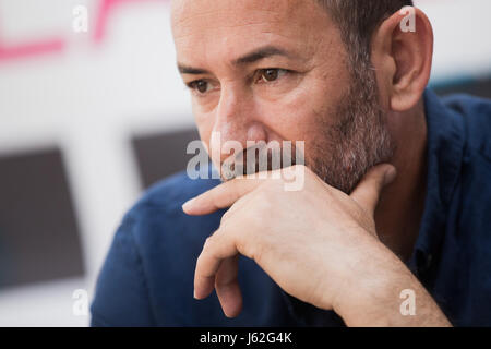 Cologne, Germany. 17th May, 2017. Oeczan Yildirim, owner of the hairdresser's shop in Cologne in front of which a nail bomb exploded in 2004, photographed during a press conference on the project 'Tribunal NSU-Komplex aufloesen' (lit. 'Tribunal Breaking up the NSU Complex') in Cologne, Germany, 17 May 2017. A public tribunal is said to point out the people involved in the NSU attacks that are not part of the official trials. The project at the Schauspiel Koeln theatre starts on 17 May and lasts five days. Photo: Rolf Vennenbernd/dpa/Alamy Live News Stock Photo