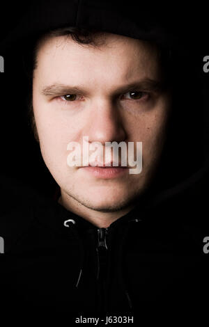 face portrait bad peccant wickedly evil guy male masculine face portrait black Stock Photo