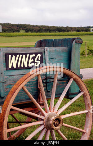 Michigan Traverse City,Leelanau Peninsula,Gill's Pier,vineyard winery,wagon wheel,grape,vine,spokes,wines,sign,antique,MI080718057 Stock Photo