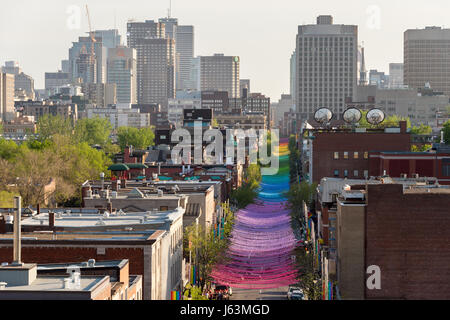 Montreal, CA - 18 May 2017: Rainbow balls art installation '18 shades of gay' on Saint-Catherine Street in gay Village Stock Photo