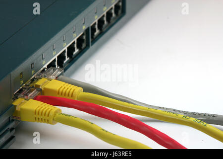 PC computers computer work factory cable router current conduction internet www Stock Photo