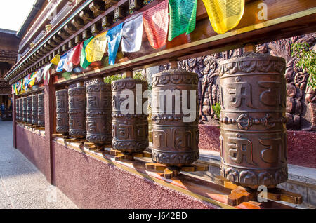 Lijiang,Yunnan - April 13,2017 : Prayer wheels in tibetan temple in Shuhe Ancient Town. Stock Photo