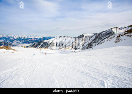 winter with ski slopes of kaprun resort next to kitzsteinhorn peak in austrian alps Stock Photo